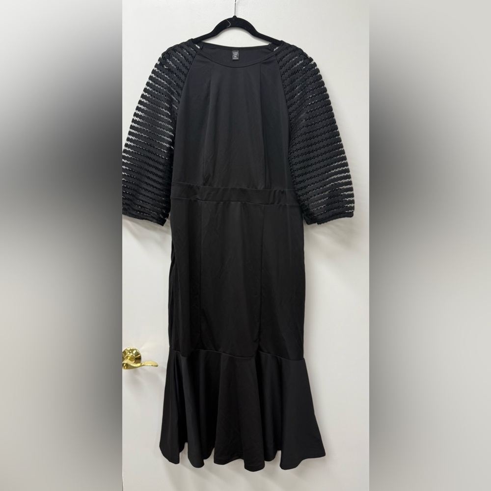 Elegant Black Dress with Sheer Sleeves